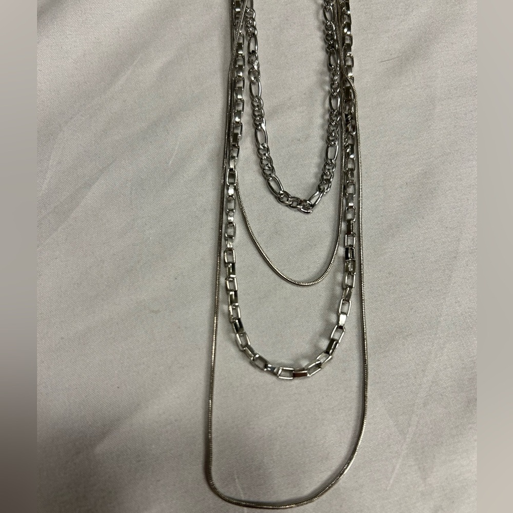 NWT set of 4 silver tone layering necklaces